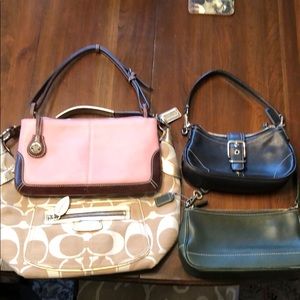 Four small purses - 3 Coach, 1 Dooney & Bourke